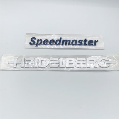 Etichetta con lettera simbolo Heidelberg grigia per marchi denominativi della macchina da stampa offset SM52 SM74 SM102